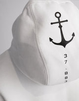 Your weekend just got a little better. Meet the Oi Captain Seas The Day classic fit hoodie.  Created from a cotton blend for instant comfy weekend vibes, crossover hood opening with rib trim applied to edge. Double-needle stitching at shoulder, neck, waistband & cuffs, and a handy kangaroo pocket. Quality vinyl heat pressed Oi Captain logo on front chest and Anchor, latitude and longitude graphic on back.